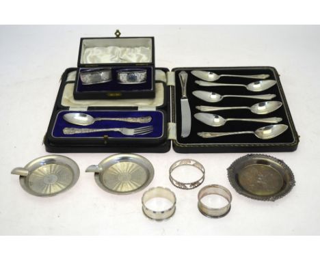 A cased set of six silver grapefruit spoons, the matching knife with loaded silver handle, William Suckling Ltd, Birmingham 1