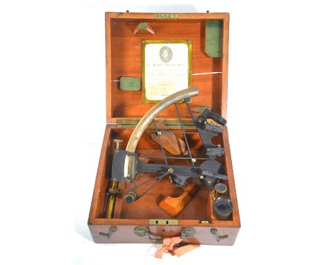 A World War I vintage sextant by Wilson & Gillie of Cardiff, no 949, with brass mount and silvered scale, in original teak bo