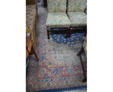 A large Turkey carpet, the blue/pale green ground with medallion to centre, 3.95 x 3.00 m Condition Report Worn overall, more