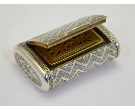 A George III silver cushion-shaped vinaigrette engraved with all-over chevron design, the gilt interior with hinged grill, Th