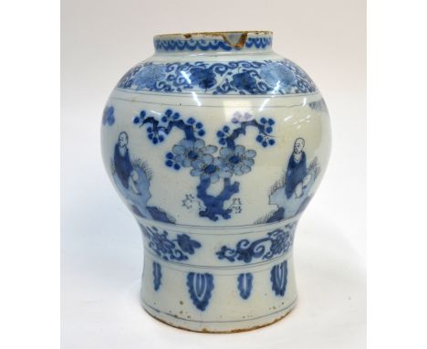 A Dutch Delft baluster vase after the Transitional Chinese original; decorated with seated scholars in a tree-lined landscape