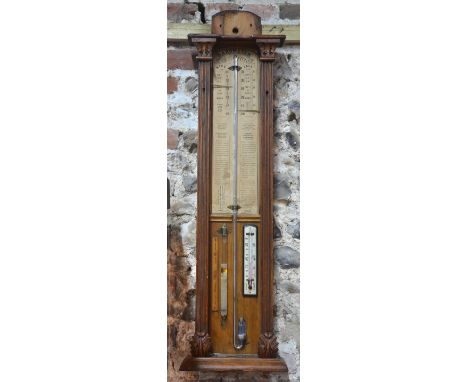 An Admiral Fitzroy oak cased barometer with mercury column, storm crystals and alcohol thermometer (case a/f)