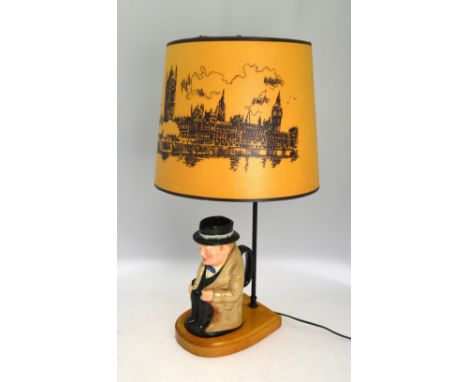 A Royal Doulton large Winston Churchill character jug mounted as a table lamp with original lampshade printed with an image o