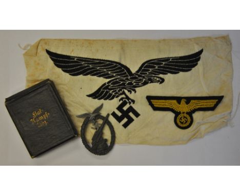 A WWII Third Reich Luftwaffe flak battery breast badge in original box of issue titled 'Flak Kampf Libz.', apparently unused 