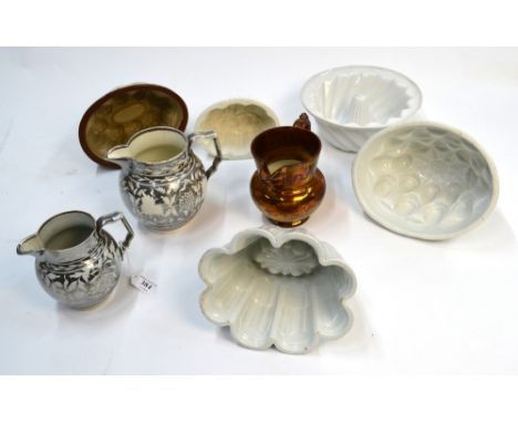 Five ceramic jelly moulds including a Shelley example and three English lustre jugs (8) Condition Report Please note that the