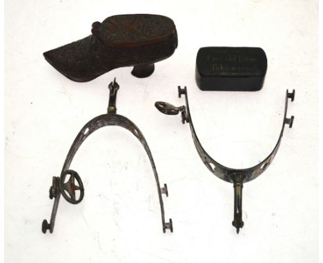 A pair of steel spurs, a Continental finely carved shoe snuff-box, the cover carved with a double-headed eagle, and a papier 