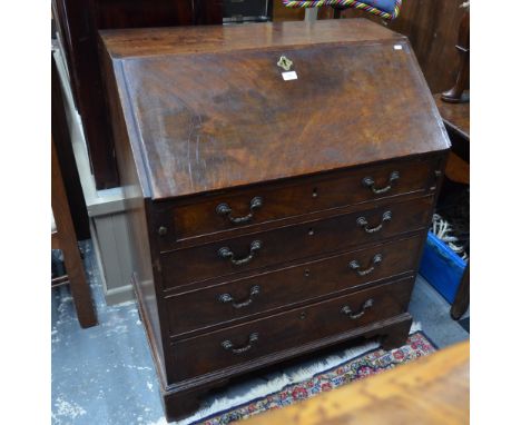 An 18th century mahogany bureau, the hinged slope enclosing a fitted stationery interior over four long graduated drawers wit