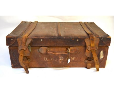 A vintage leather travelling trunk with red fabric lining Condition Report Scuffed and distressed - no holes