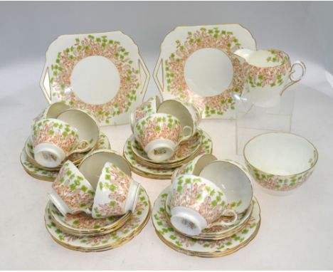 A Shelley part tea Service, comprising: 12 saucers; sugar basin; two cake dishes; 12 side plates; milk jug and 12 cups. Numbe