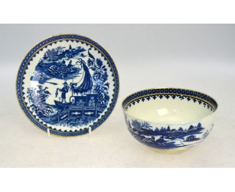 A Worcester blue and white bowl with an associated dish; both decorated with the 'Fisherman and Cormorant' pattern; the bowl 