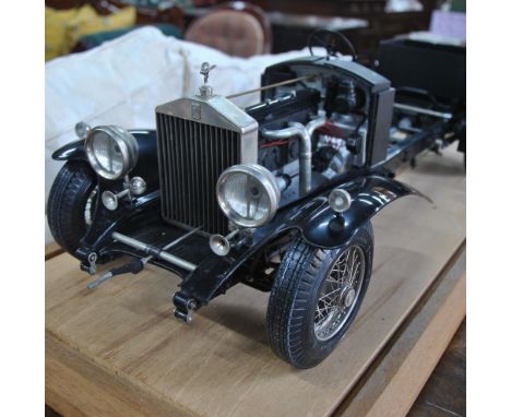 A Pocher 1/8 scale model A scale model Rolls Royce Phantom II drop head secanda coupe (part constructed) contained within a p