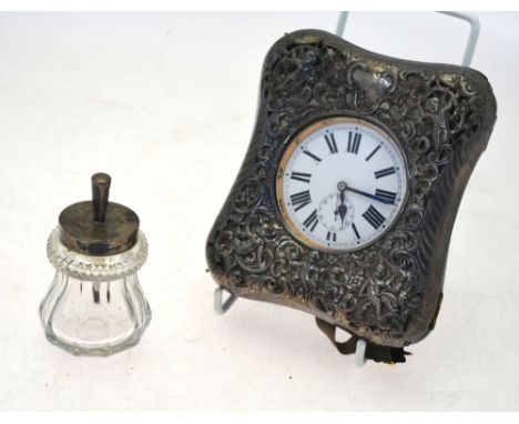 A late Victorian silver-faced travelling watch-case with pierced decoration, London 1899, containing an electroplated watch w