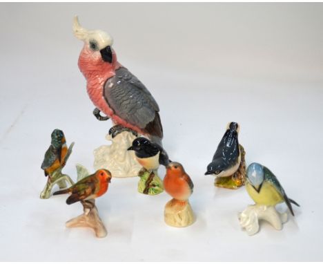 Beswick Cockatoo, no 1180, Stonechat, no 2274 and Nuthatch no 2413 to/w two Goebel Robins and a Kingfisher and a continental 