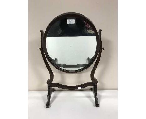 A late Victorian mahogany toilet mirror and a brass table lamp 