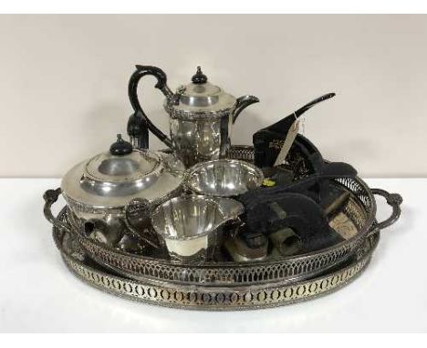 A four piece EPNS tea service, two plated trays and two desk top punches 
