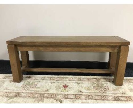 A contemporary oak bench 