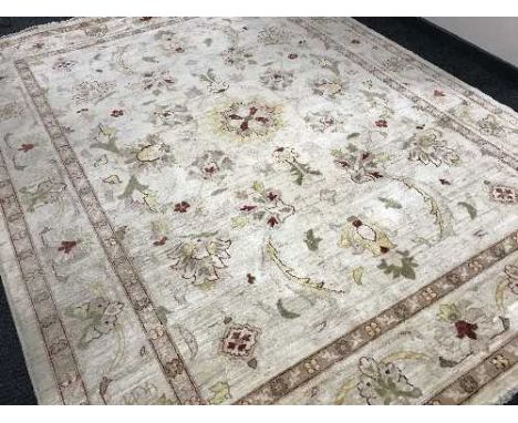 A large fringed Ziegler carpet 