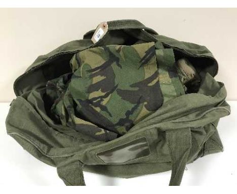 A bag of army DP clothing 