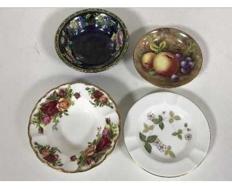 A Royal Worcester small dish painted by B. Cox, together with a Maling dish Wedgwood ashtray and a Royal Albert ashtray (4)