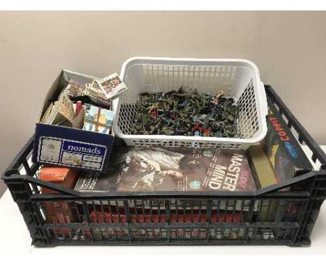 A box of vintage toys, plastic soldiers, board games, marbles, pin badges and a box of football cards etc 