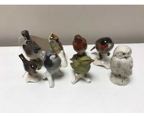 A collection of Beswick and Goebel bird figures (8)