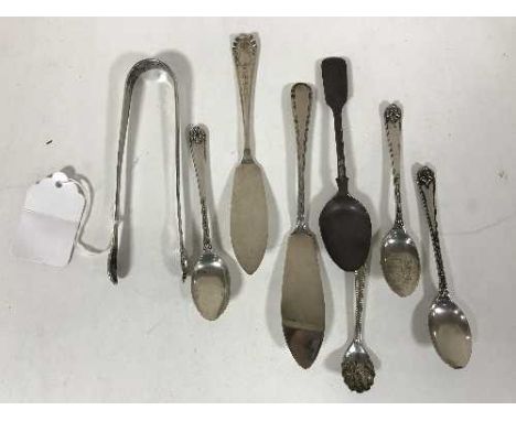 A group of silver including a pair of Georgian sugar tongs, 5.8oz, together with a plated caddy spoon (8)