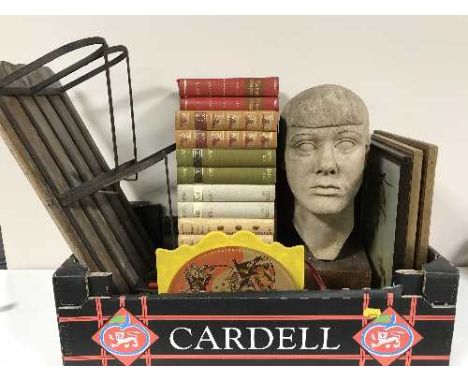 A box of framed pictures, pottery head sculpture, wooden paper rack, Selcol wind up record player 
