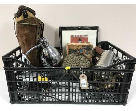 A crate of clothes airer brackets, lamp, deer stalker hat, books, brass ware, two artificial legs etc 