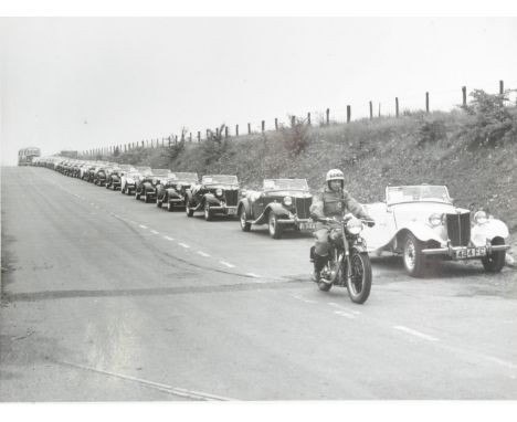 A mid-20th Century silver print photograph album of Morris and MG motor cars for B J Henry Ltd of Cowley Oxford,  commerciall