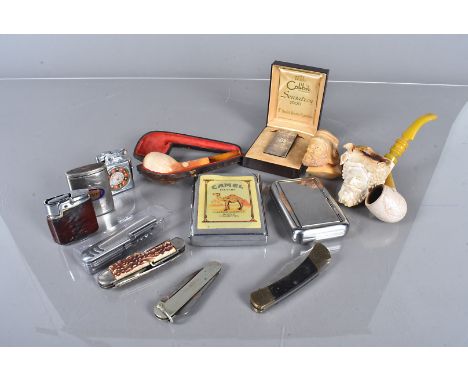 A collection of smoking related items, to include a collection of lighters, comprising a boxed Colibri Sensation 2000 with en