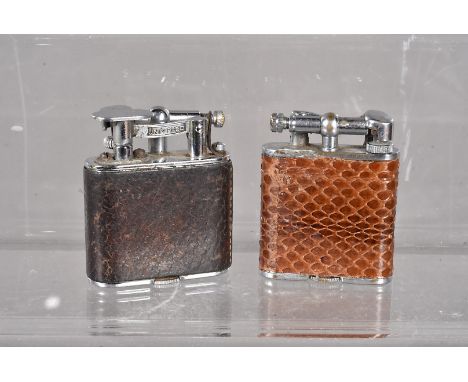 An Orlik petrol pocket lighter, nickel plated with an original snake skin wrap, plus a Saffa Universo (Italian) petrol pocket
