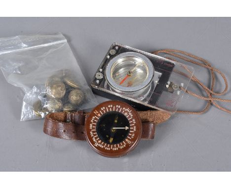 A Pilot's wrist compass, in brown bakelite, on brown leather strap, together with another compass and a small collection of b