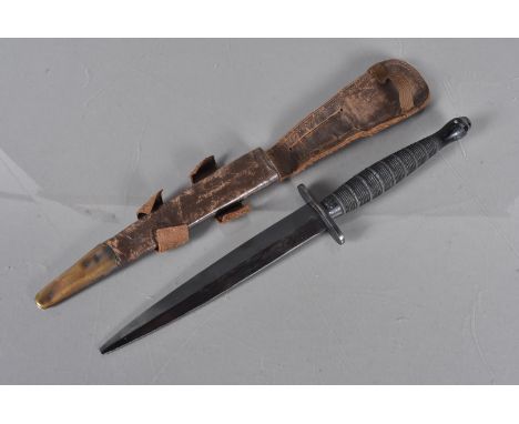 A Fairbairn Sykes fighting dagger, originally owned by Charles Thomas Williams of the Para Regiment and the S.A.S, unmarked, 