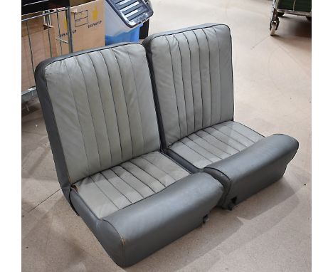 A pair of Vintage Restall Type II car seats, in dark and light grey, complete with brackets (4)