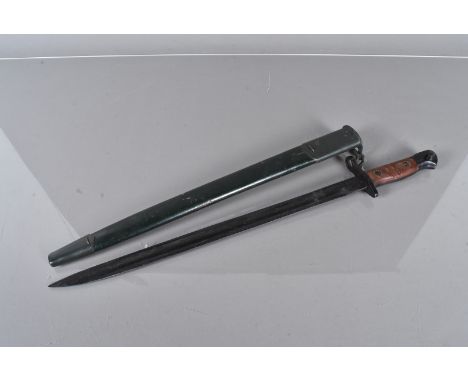 A US 1917 bayonet and scabbard, stamped MDE to the blade, the green scabbard also with the hanger