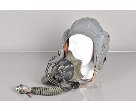 A blue canvas military pilot's flying helmet, with broad arrow stamped label to inner '22C/1731 size 3', complete with ear ph