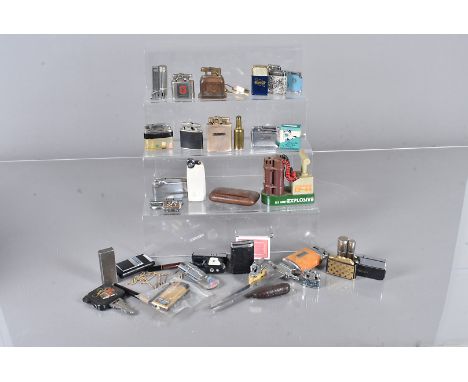 A large collection of novelty lighters, including Ronson, Orion, Rolex, Tommy, Park, Dice, Gun, Lido, IMCO, Le Follett (parts