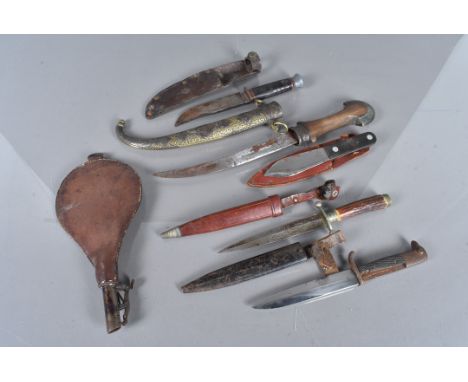 A small selection of knives, to include an antler handled hunting knife, a Plummet Major Throwing knife, a Middle Eastern dag