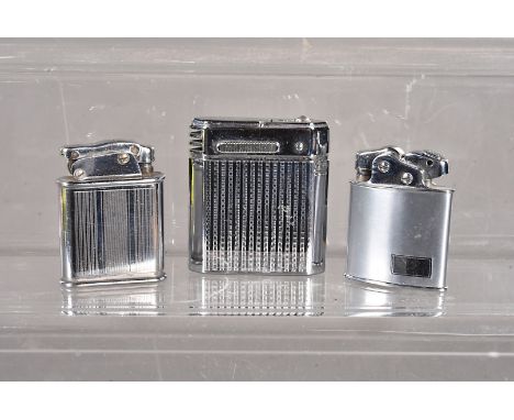 A French Nova petrol pocket lighter, with secondary pull out fuel tank, together with a Thorens Oriflam petrol pocket lighter