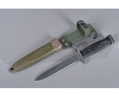 A US M7 bayonet, complete with US M8A1 scabbard, stamped PWH