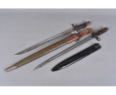 A US 1913 Pattern Remington bayonet, dated 1917, complete with scabbard, marked GF to lower, and leather frog, together with 