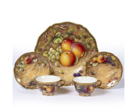 Royal Worcester cabinet plate painted with fruit, signed, and a pair of Royal Worcester cabinet cups and saucers painted with