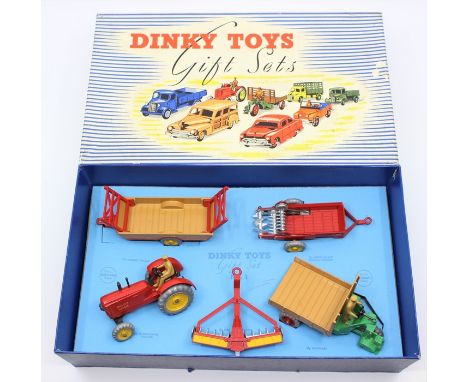 Dinky: A boxed Dinky Toys Gift Set, No. 1, Farm Gear, comprising: 27a Massey-Harris Tractor; 27b Harvest Trailer; 27g Motocar