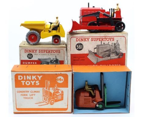 Dinky: A collection of three boxed, Dinky Toys, to comprise: Dumper Truck, 562, yellow body; Blaw Knox Bulldozer, 561, red bo