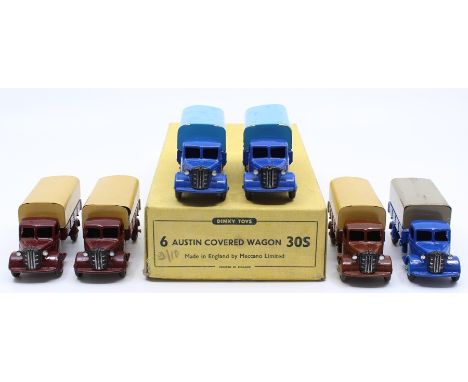 Dinky: A trade box, Dinky Toys, comprising six, Austin Covered Wagon, 30S, two examples in two-tone blue, three examples in m