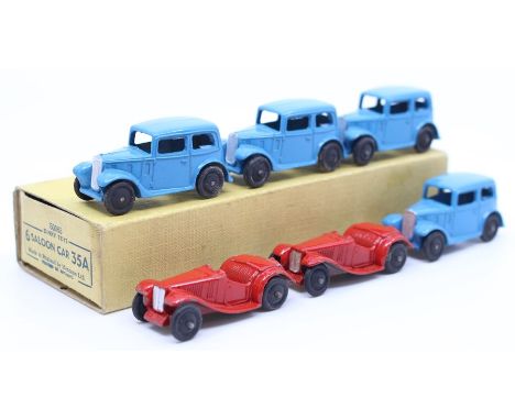 Dinky: A trade box, comprising of four, 35A, Saloon Car, blue body, together with two other Dinky Toys vehicles, red body, ve