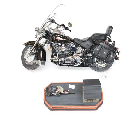 Franklin Mint: A Harley Davidson Softail 1:10 scale motorcycle, some parts loose, together with Harley Davidson Mechanical Ba