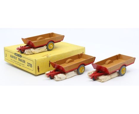 Dinky: A trade box, Dinky Toys, comprising three, 27B, Harvest Trailer, tan and red body, vehicles appear good, box generally