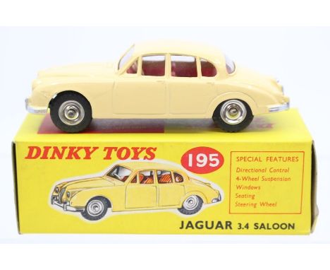 Dinky: A boxed, Dinky Toys, 195, Jaguar 3.4 Saloon, cream body, red interior, illustrated box, slight creasing to box ends.