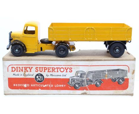 Dinky: A boxed, Dinky Supertoys, Bedford Articulated Lorry, 521, yellow and black body and trailer, paint chips, box poor, cr